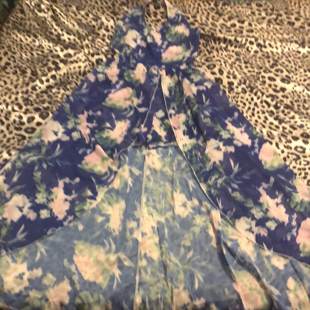 Halter romper with long wrap type skirt that slits at the waist